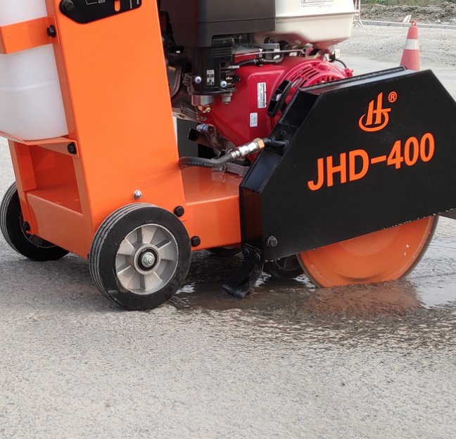 https://image.made-in-china.com/2f0j00PipgfubGJJko/Safe-Straight-Line-Concrete-Road-Cut-off-Walk-Behind-Cutter-Saw-Machine-with-High-Durability-Gasoline-Power-Engine.jpg